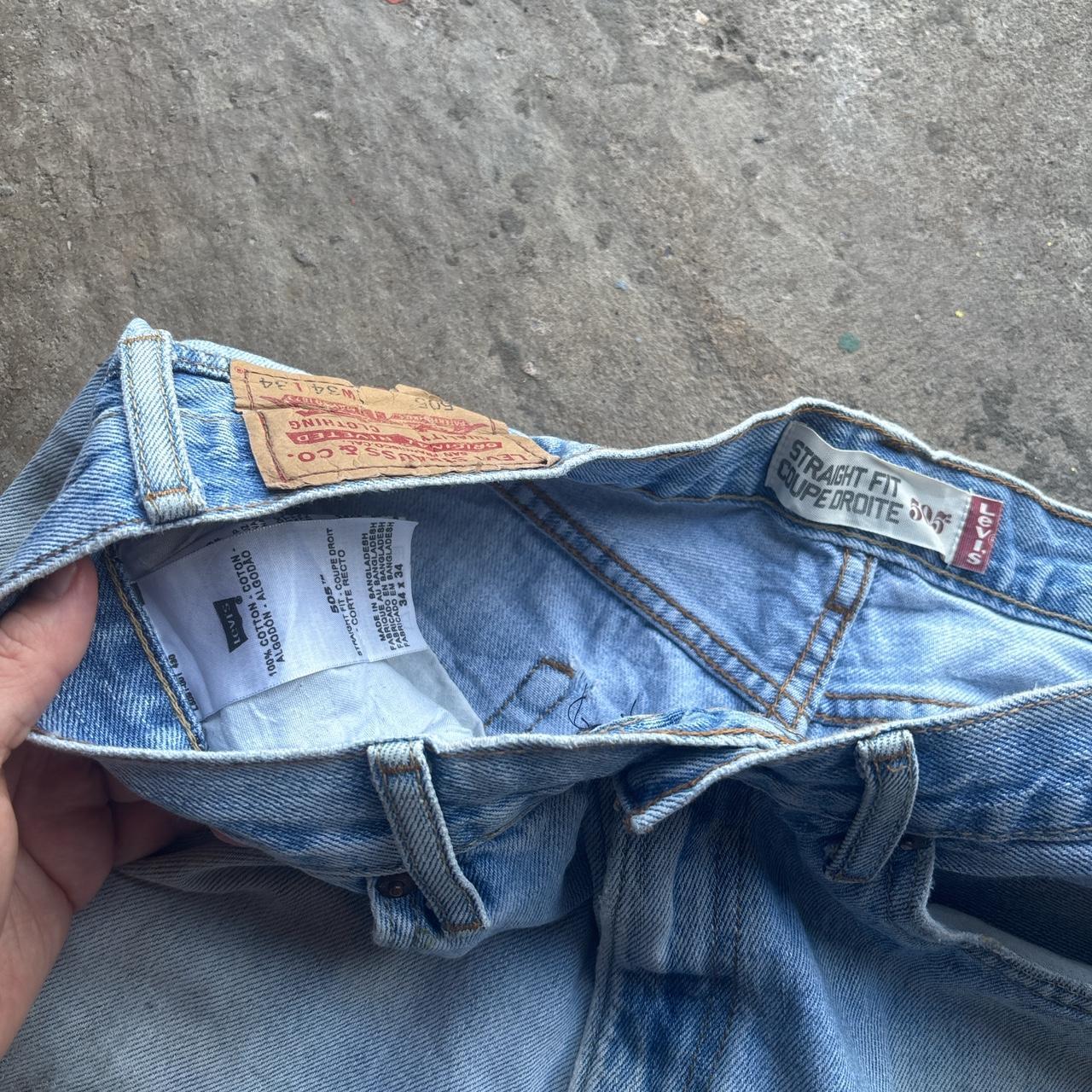 Distressed blue Levi’s cut off shorts