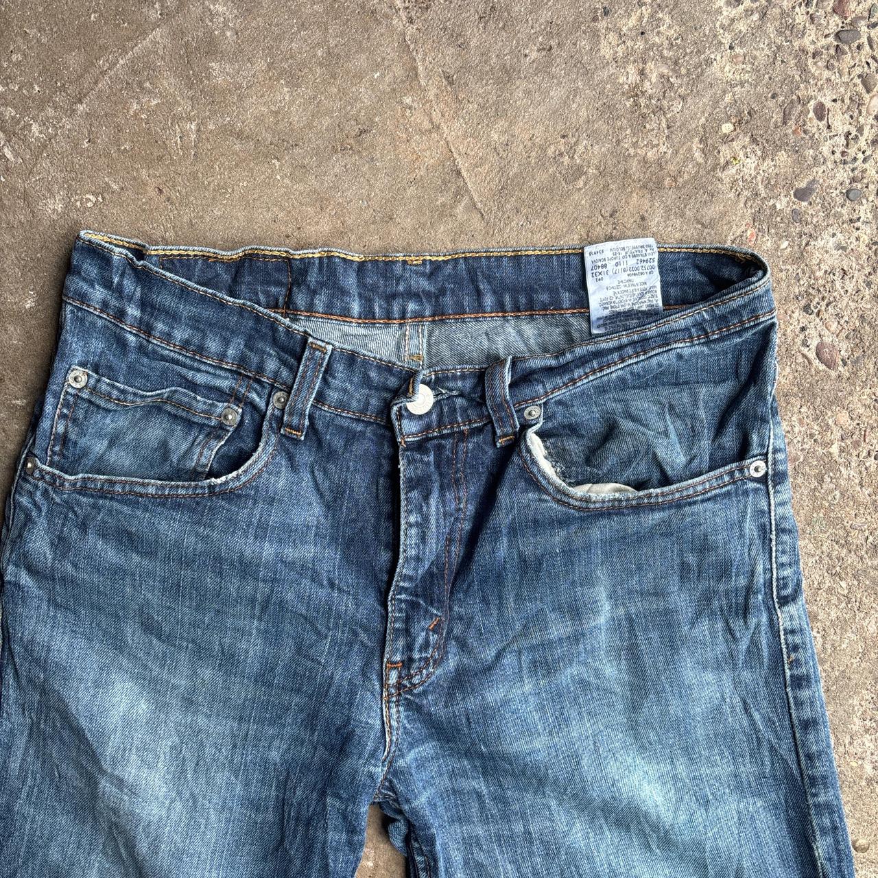 Blue Denim Distressed Levi’s Jeans
