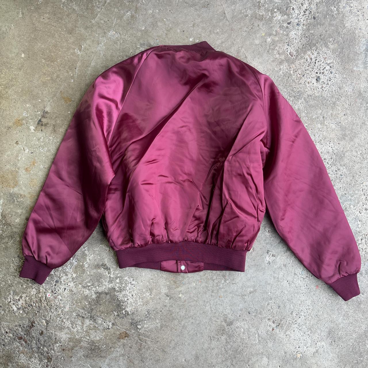 Jim’s Burgundy vintage bomber jacket with embroidered logo