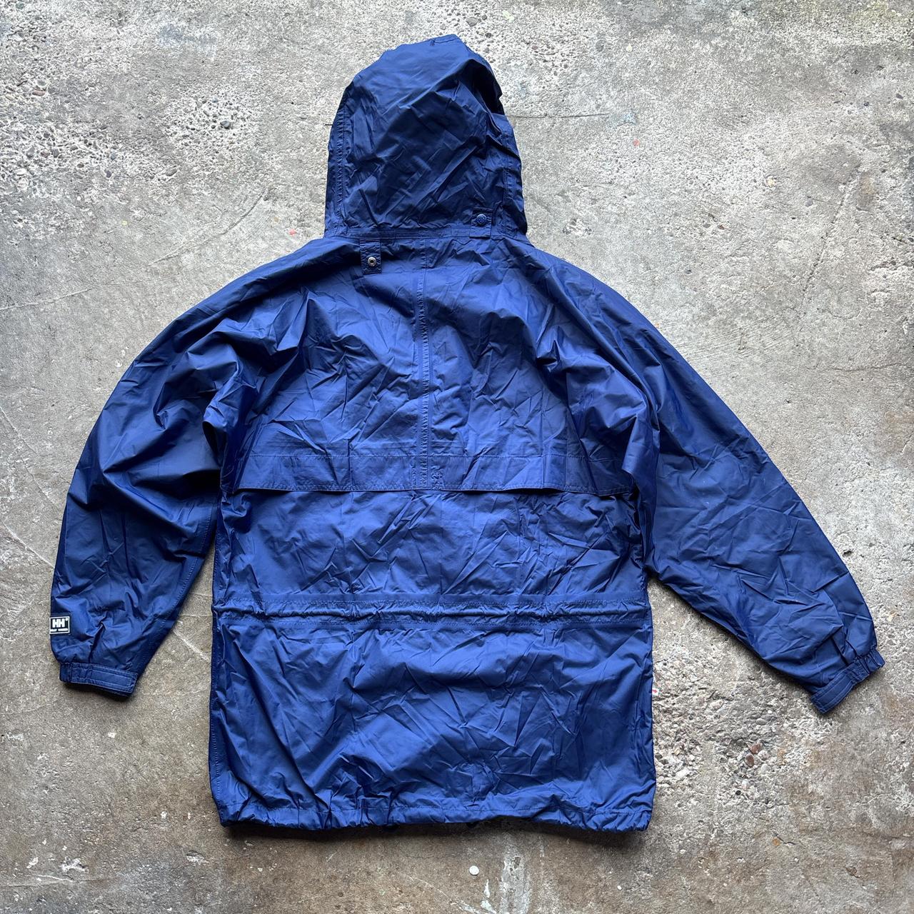 Blue vintage Helly Hansen lightweight windbreaker jacket