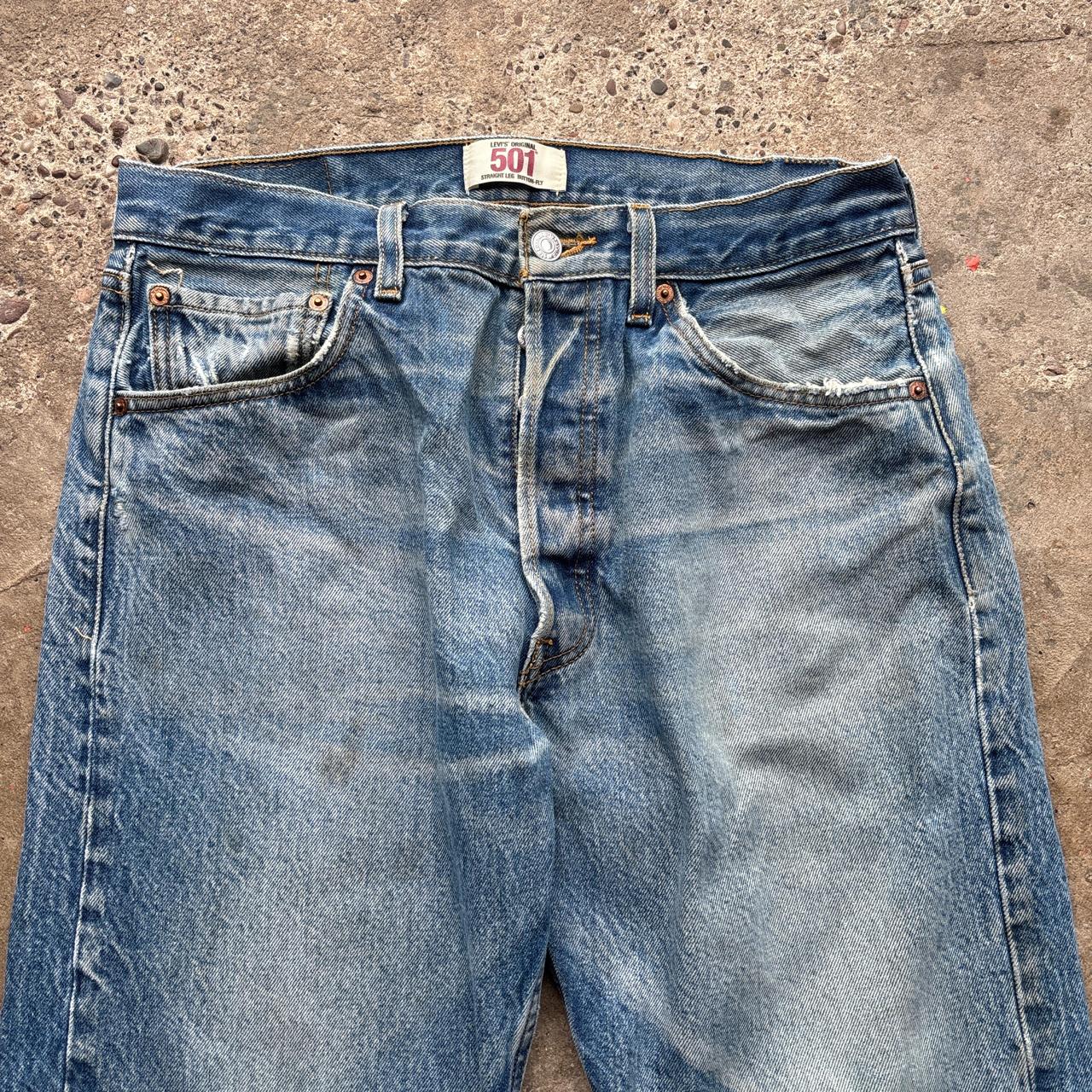 Blue Levi’s 501 distressed jeans - W34