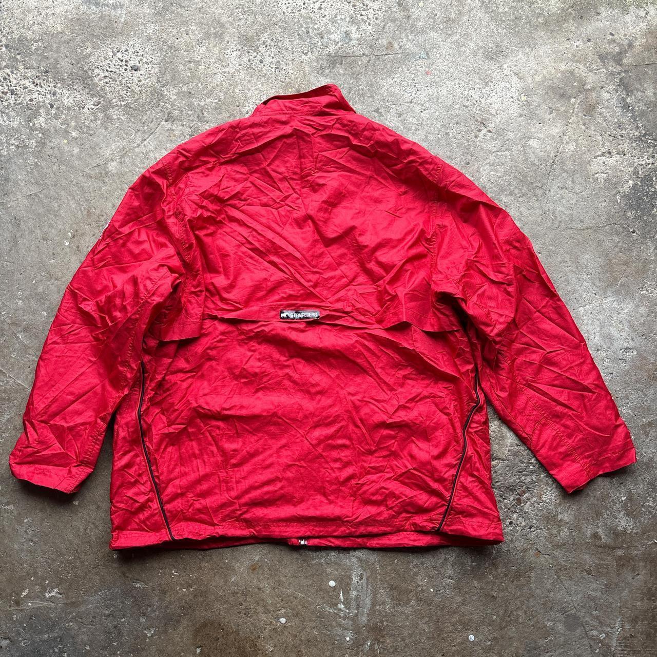 Red Reebok track jacket with embroidered logos