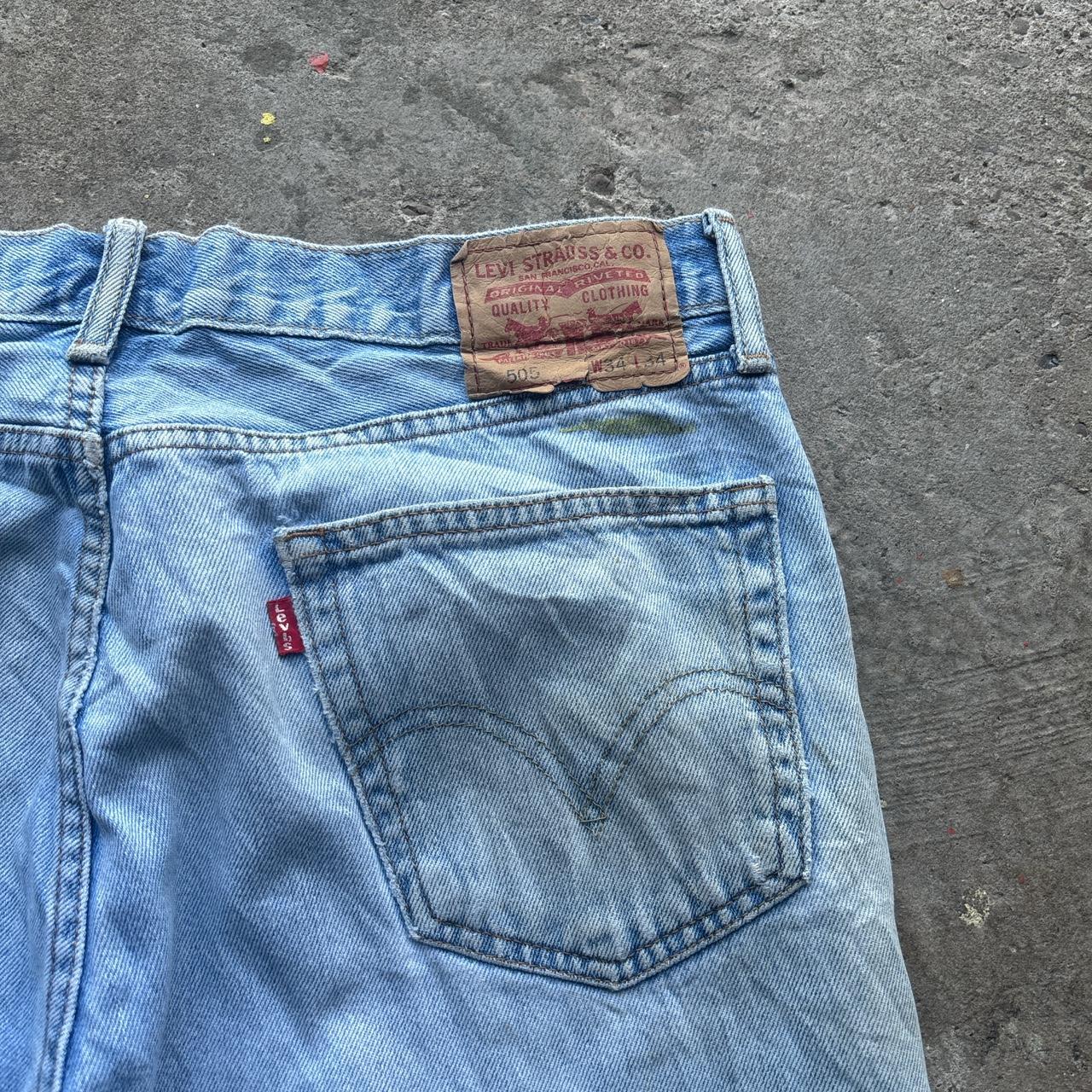 Distressed blue Levi’s cut off shorts