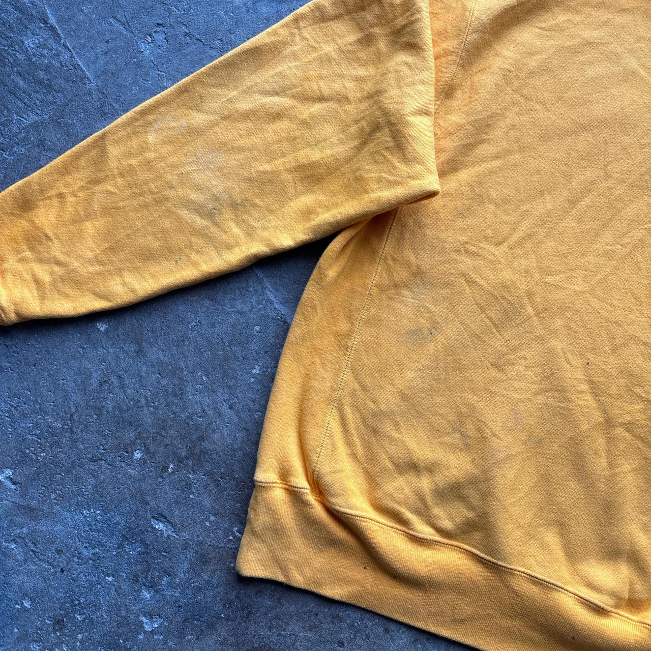 Yellow Champion hoody with ‘Blazy’ print
