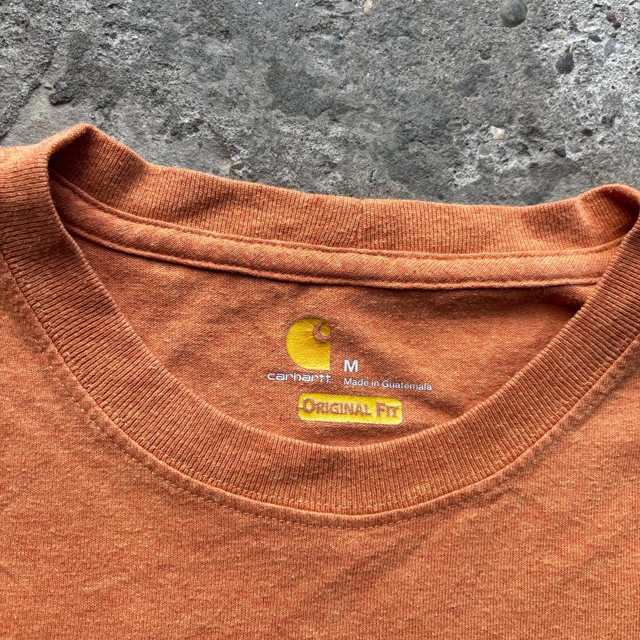 Orange Carhartt pocket tee with company logo - M