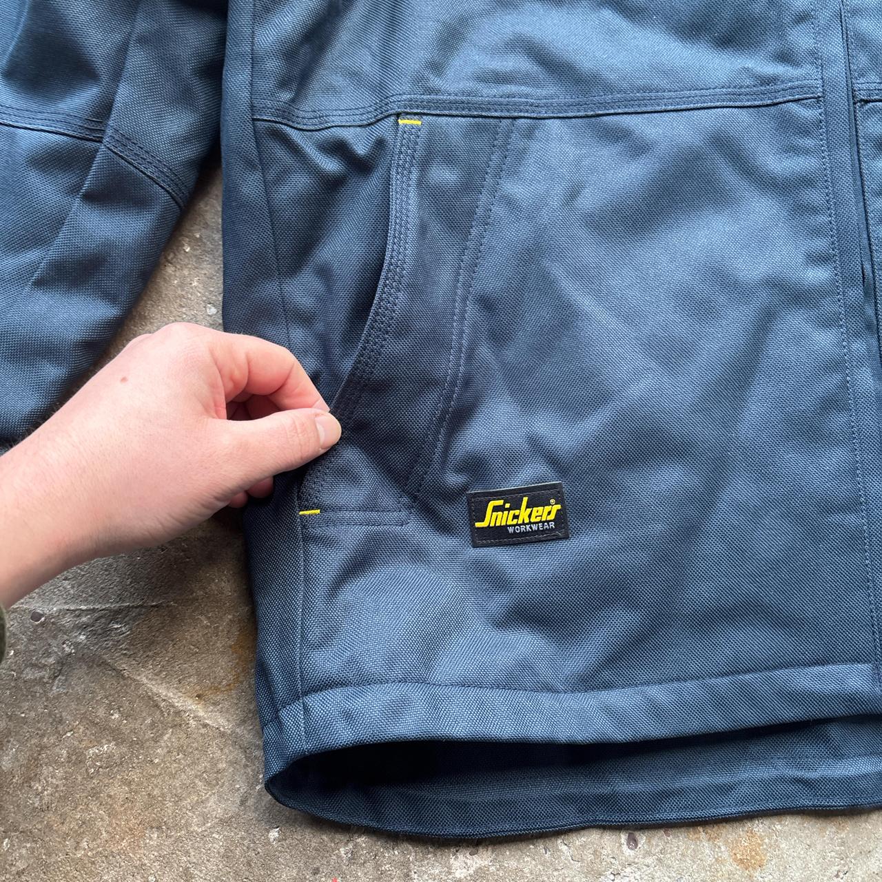 Navy Snickers workwear jacket with embroidered logos