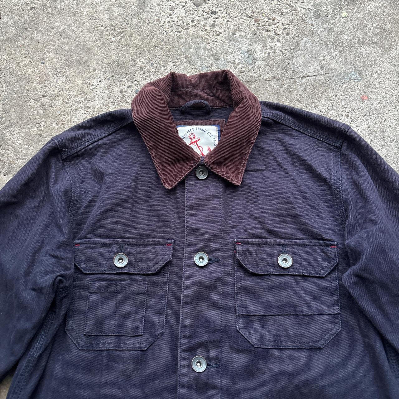 Navy workwear jacket with burgundy collar