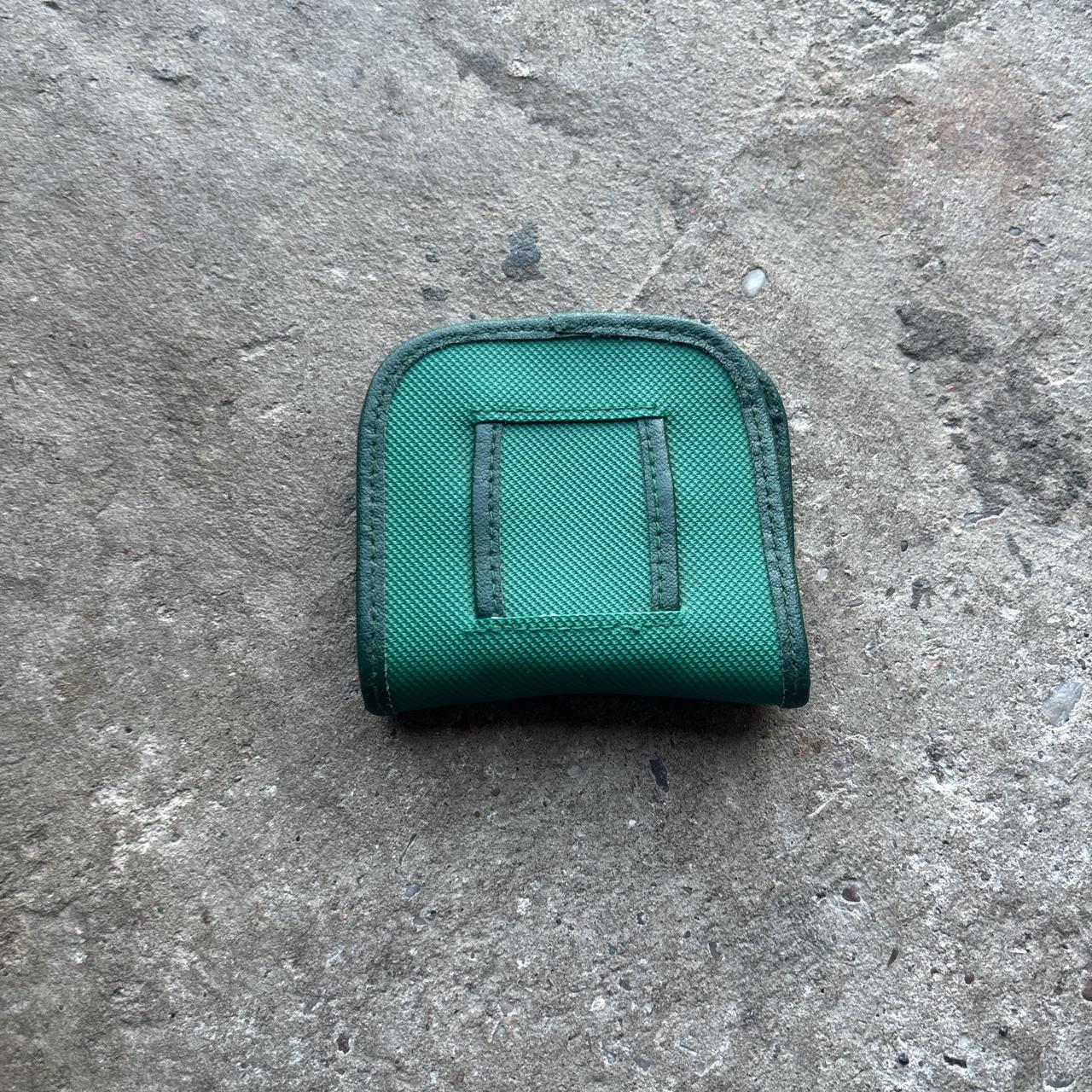 Vintage Lacoste tee and marker holder