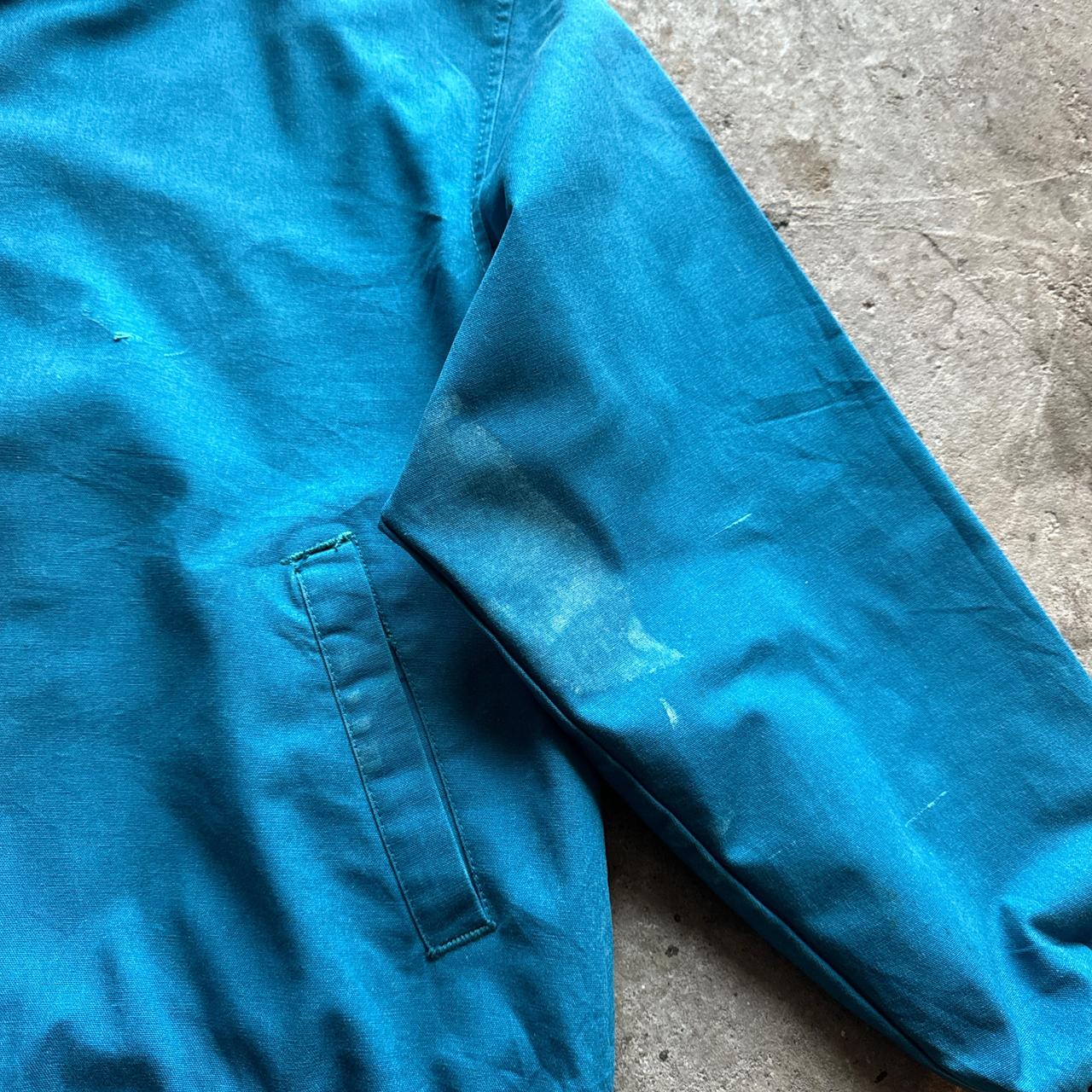 Torquoise workwear jacket with Aztec collar