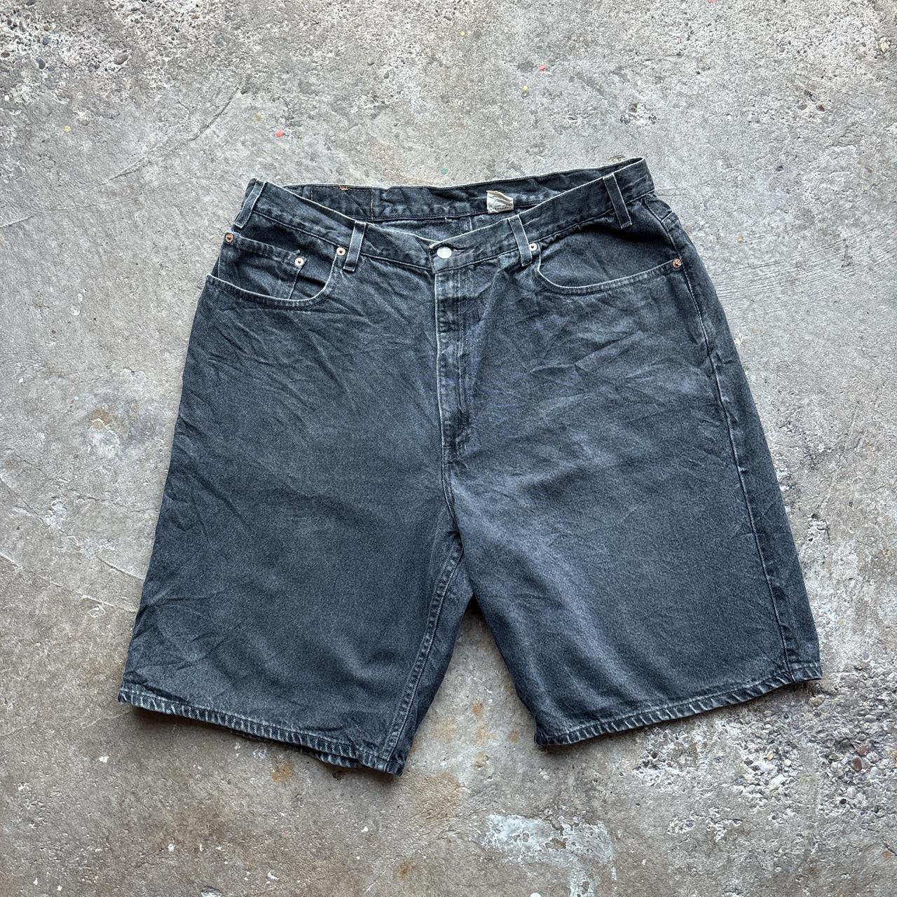 Washed black Levi’s 560 shorts