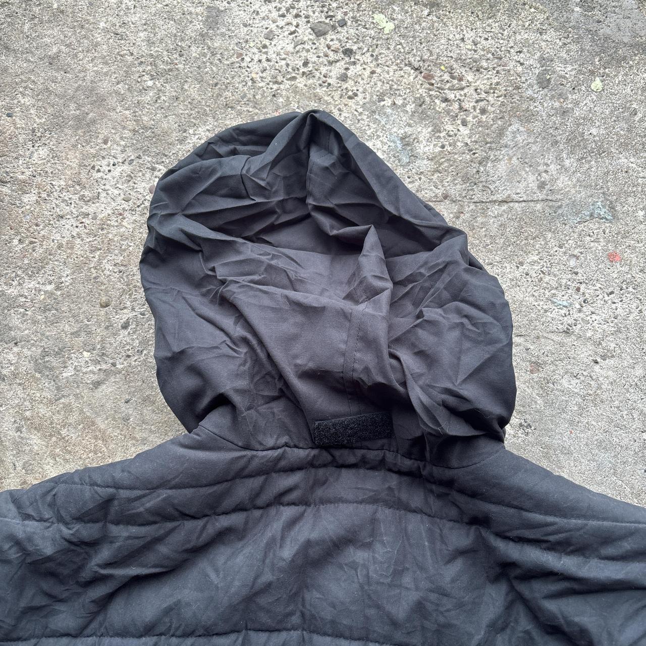 Black Adidas puffer jacket with embroidered logo