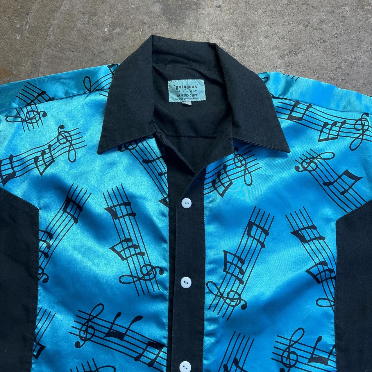 Blue and black musical notes bowling shirt