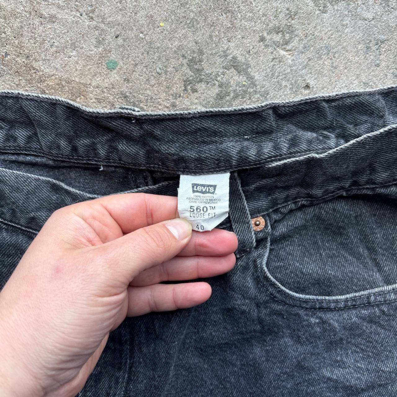 Washed black Levi’s 560 shorts
