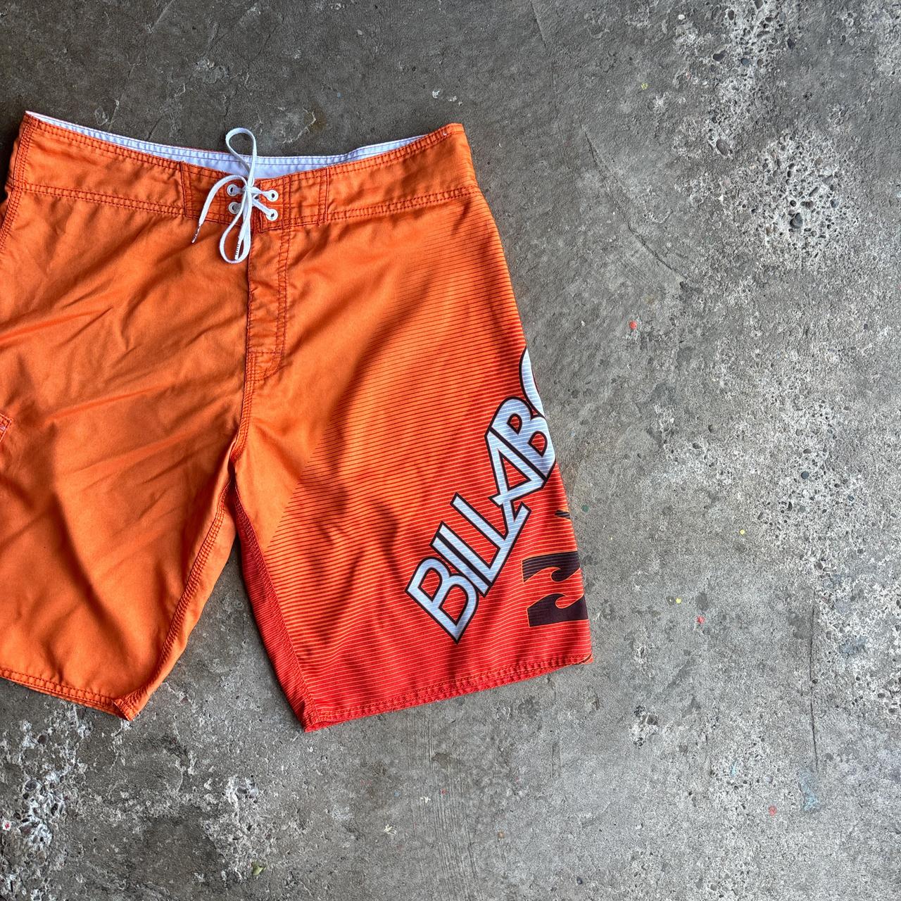 Orange Billabong Board Shorts/Swimming Trunks