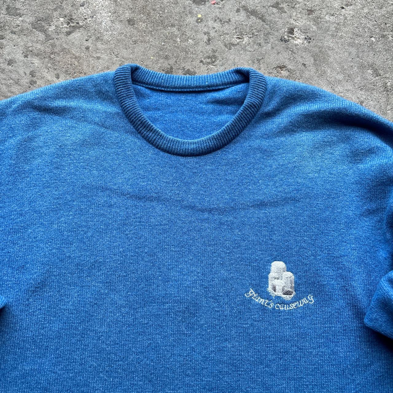 Blue wool jumper with Giant’s Causeway embroidered logo