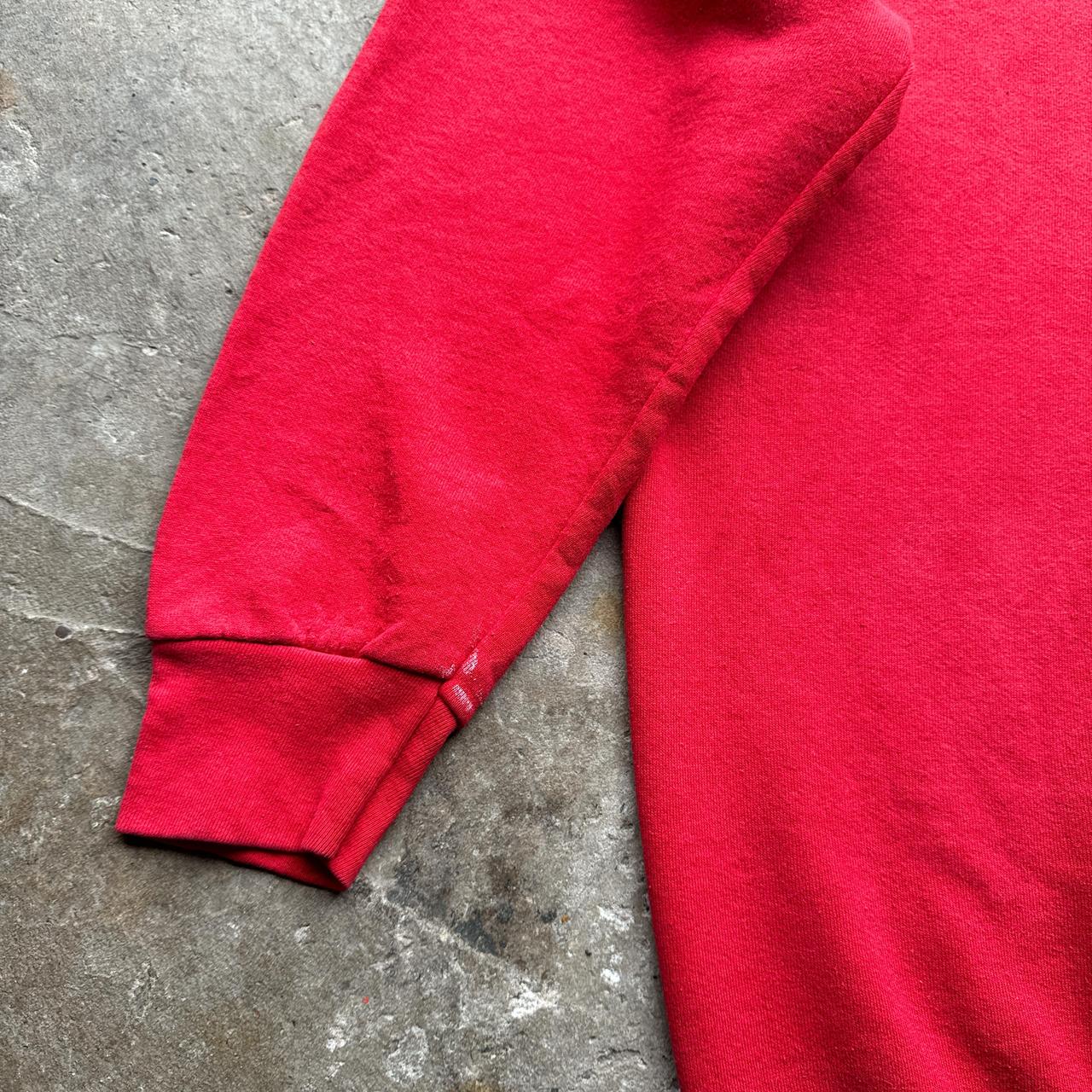 Red graphic sweatshirt printed on Fruit of the Loom