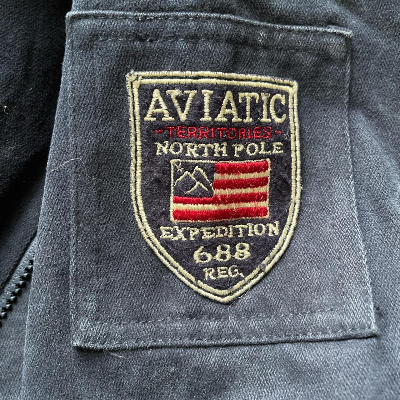 Blue aviatic jacket with soft green lining