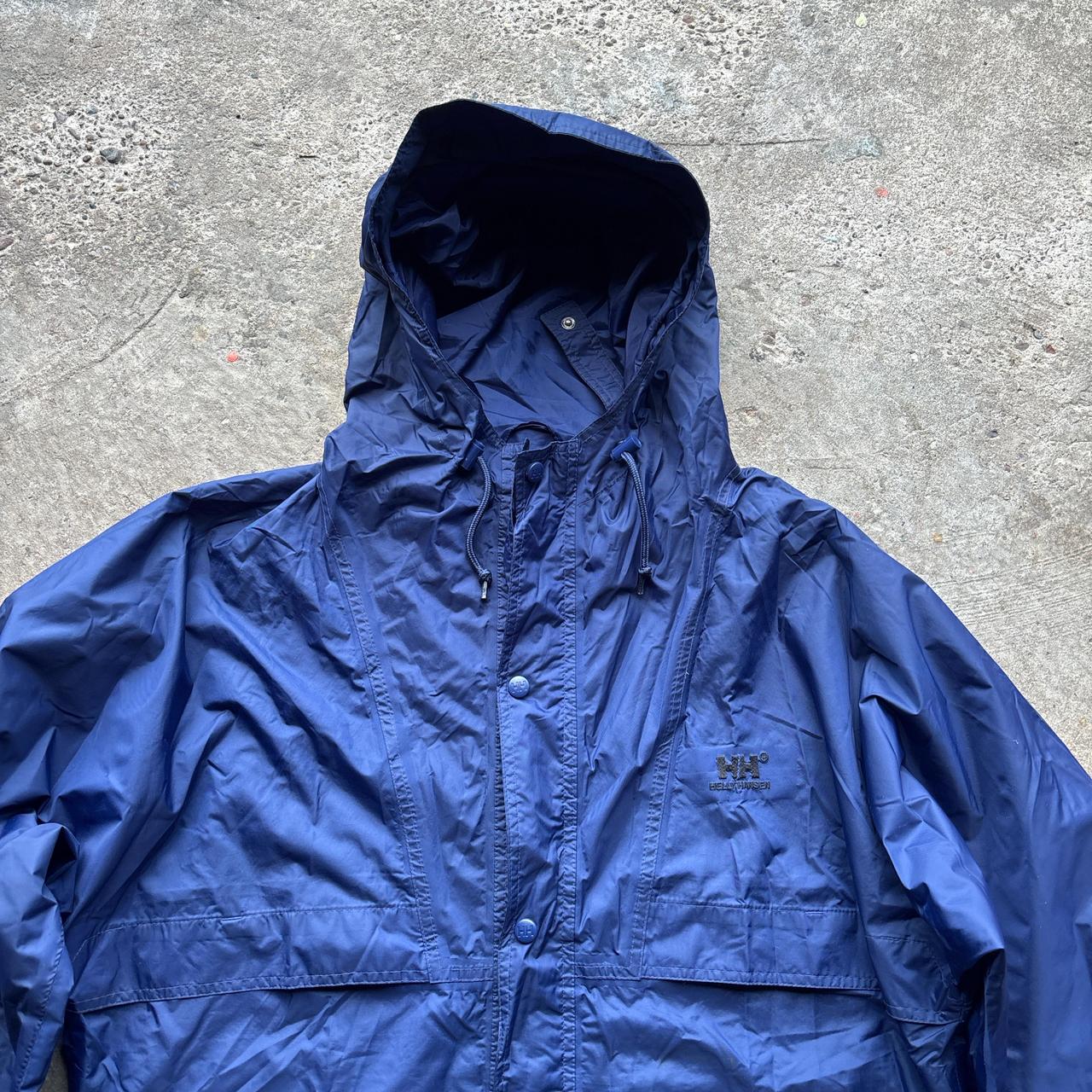 Blue vintage Helly Hansen lightweight windbreaker jacket