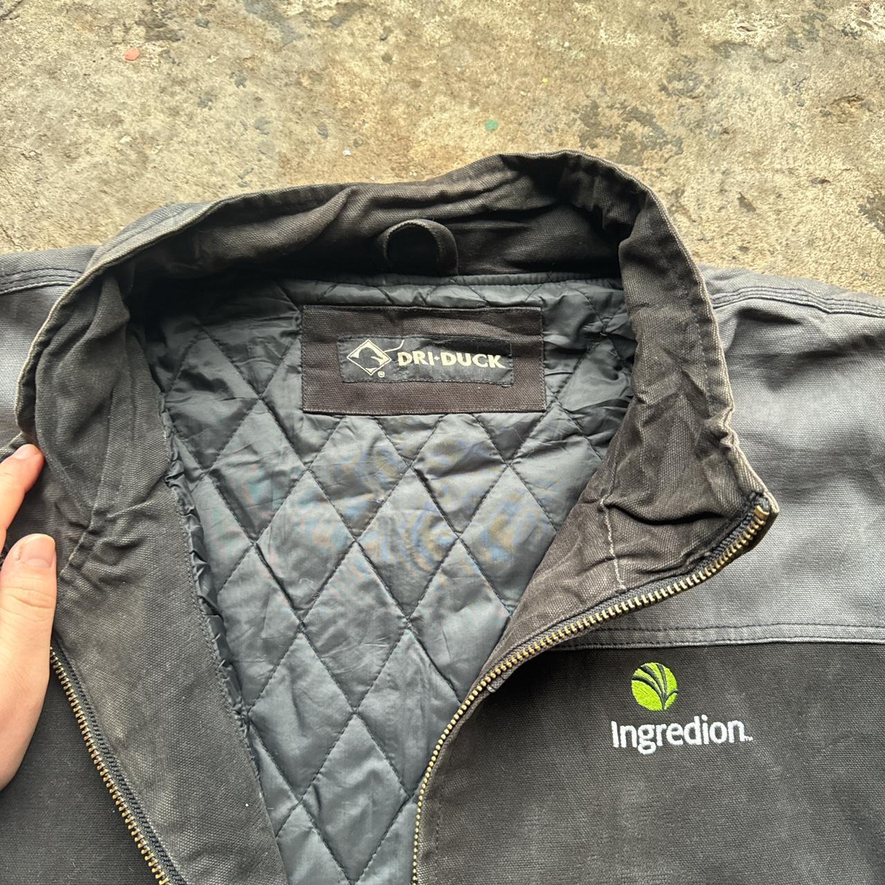 Grey and black workwear jacket with embroidered logos