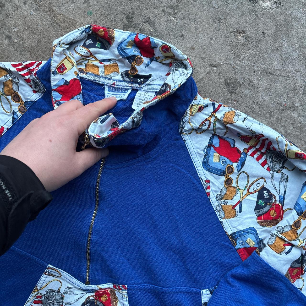 Blue and patterned half-zip sweatshirt