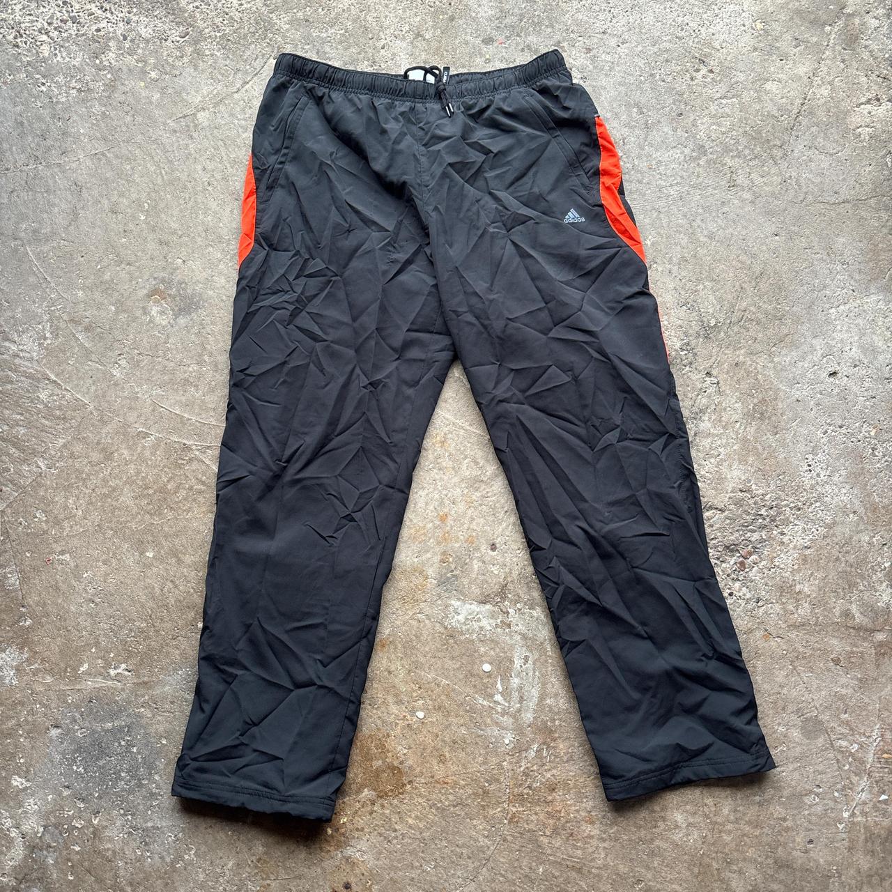 00s Black and orange Adidas track pants