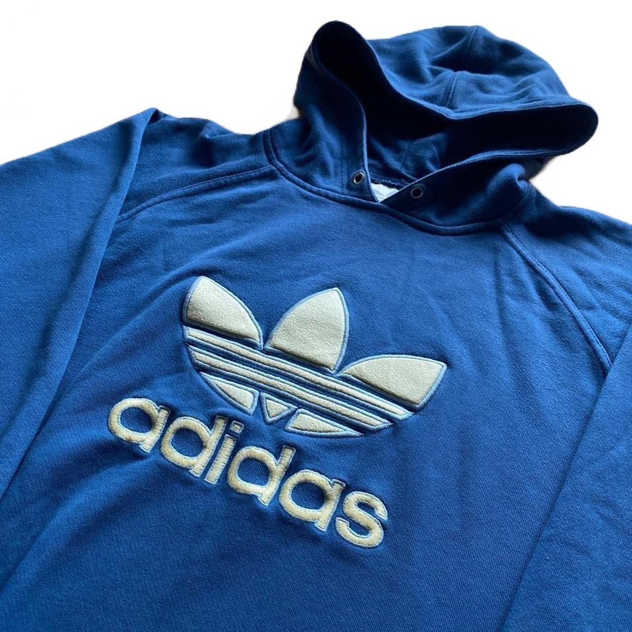 Blue Adidas Originals hoody with yellow raised logo