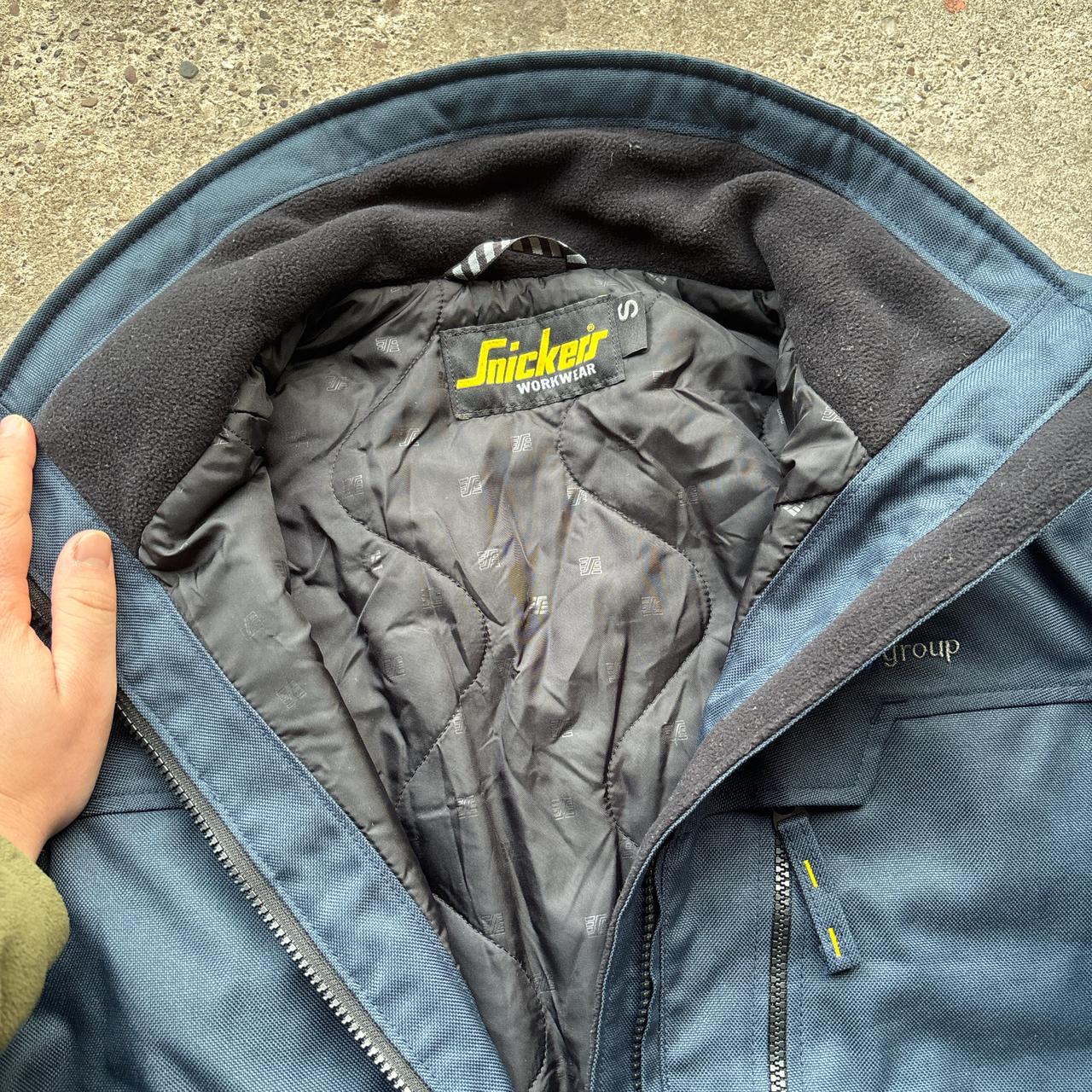 Navy Snickers workwear jacket with embroidered logos