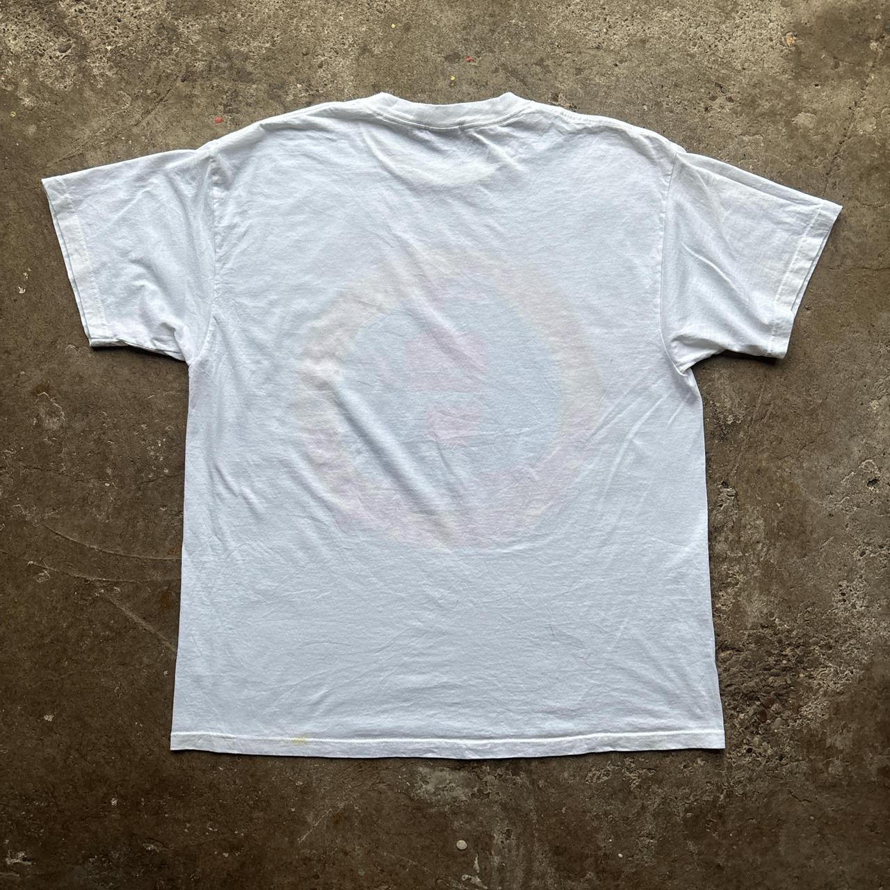 White graphic tee with ‘Santa Ski Club’ graphic