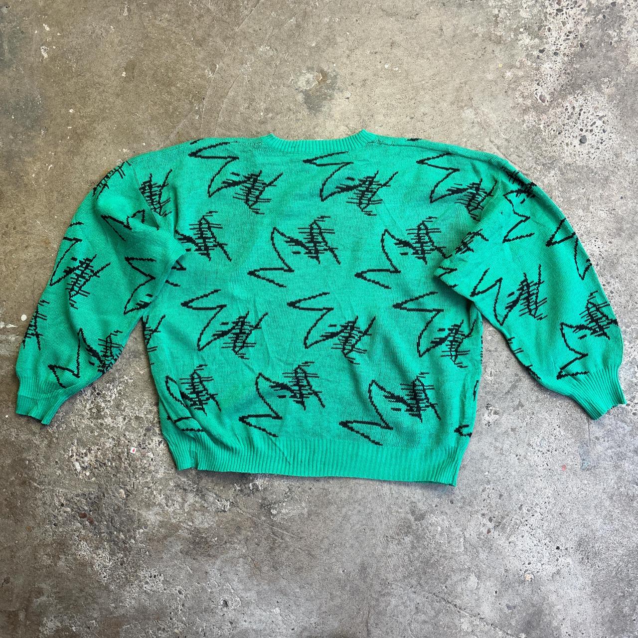 Green and black knitted sweater