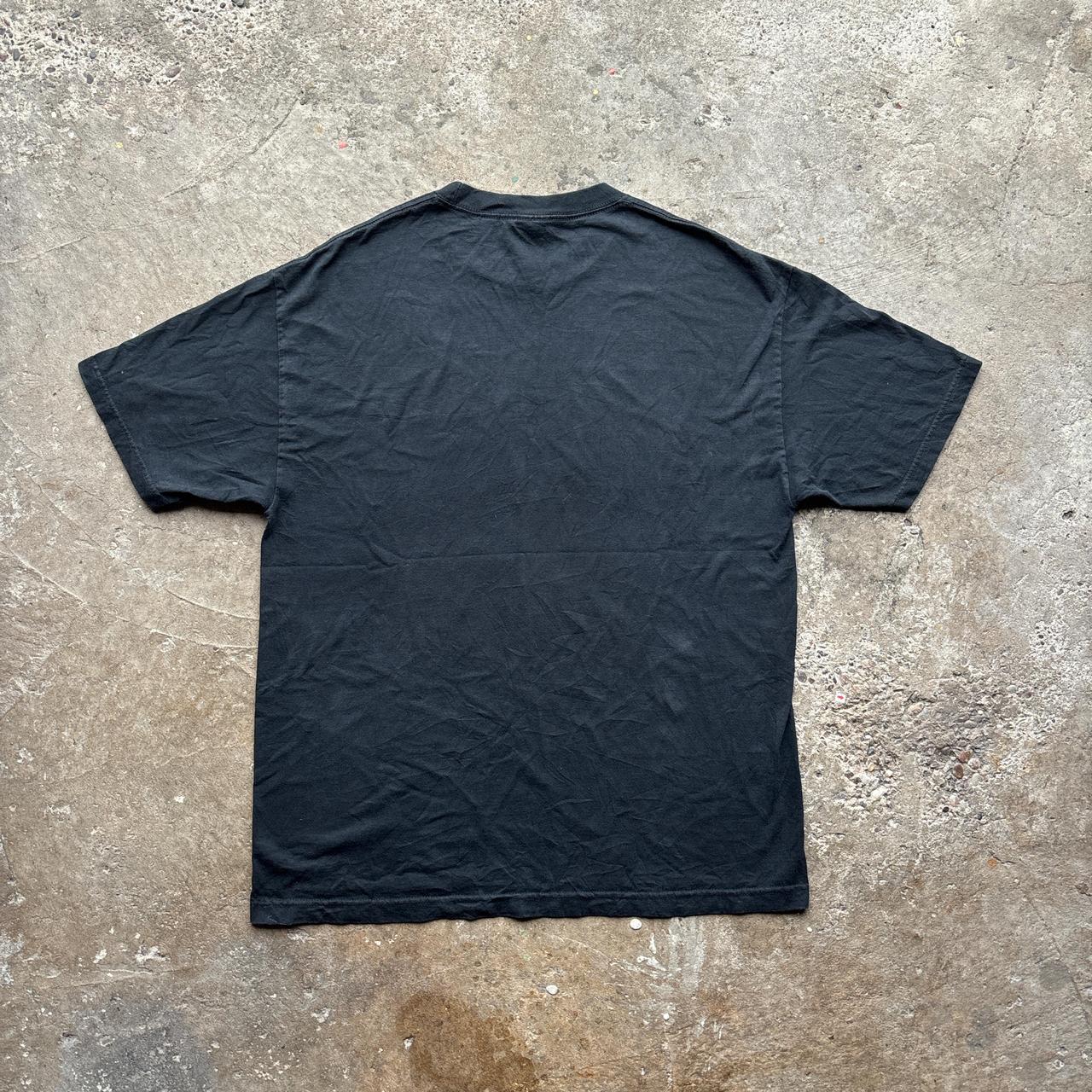 Black graphic tee with Niagara Falls, Canada wolf print