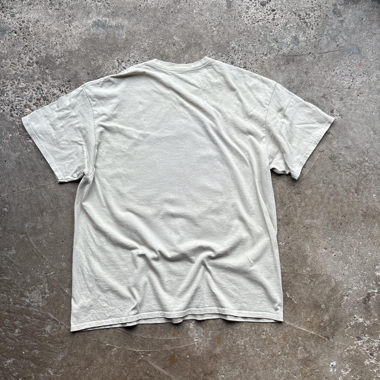 Cream Anchorman promotional tee