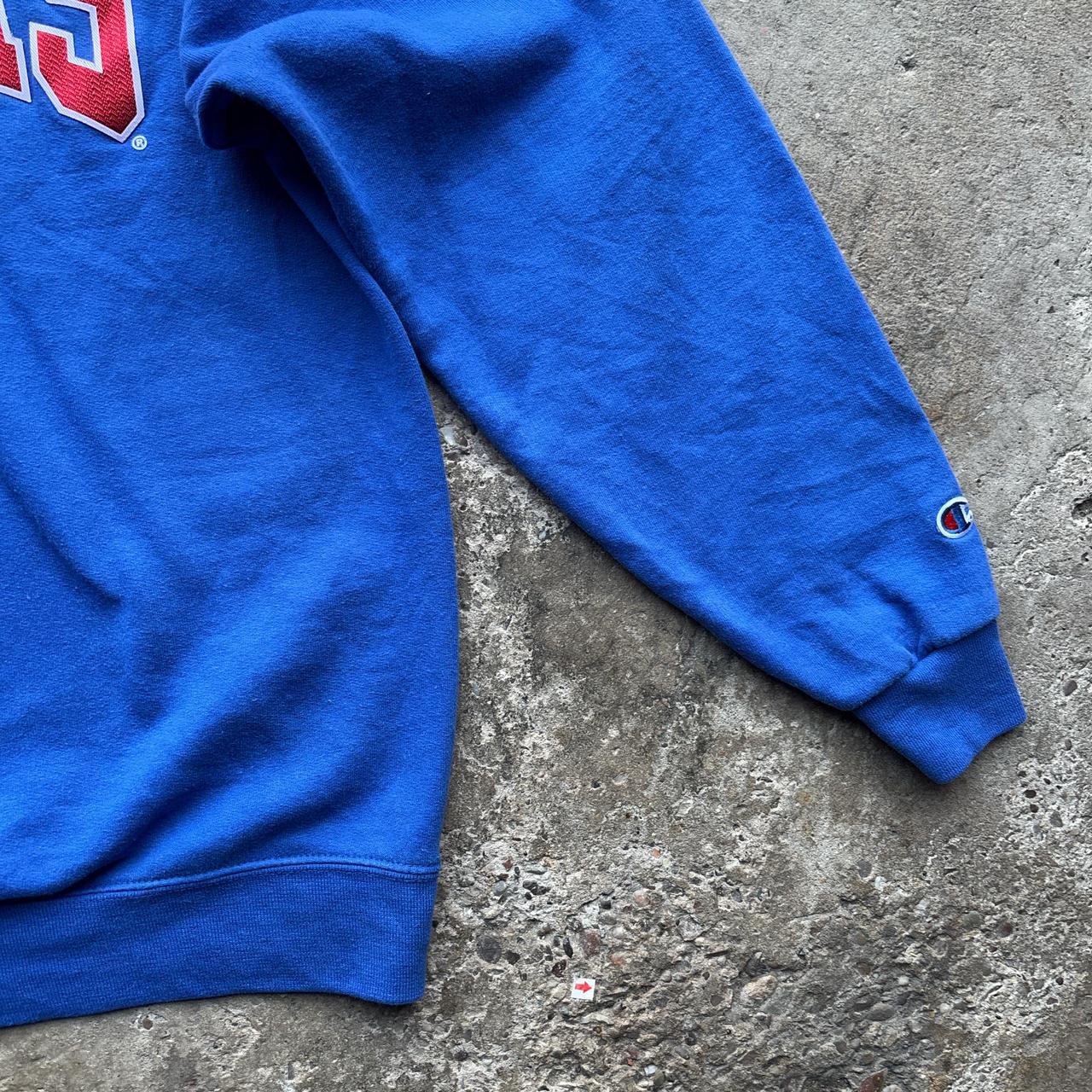 Blue Champion crewneck sweatshirt with Kansas University logo