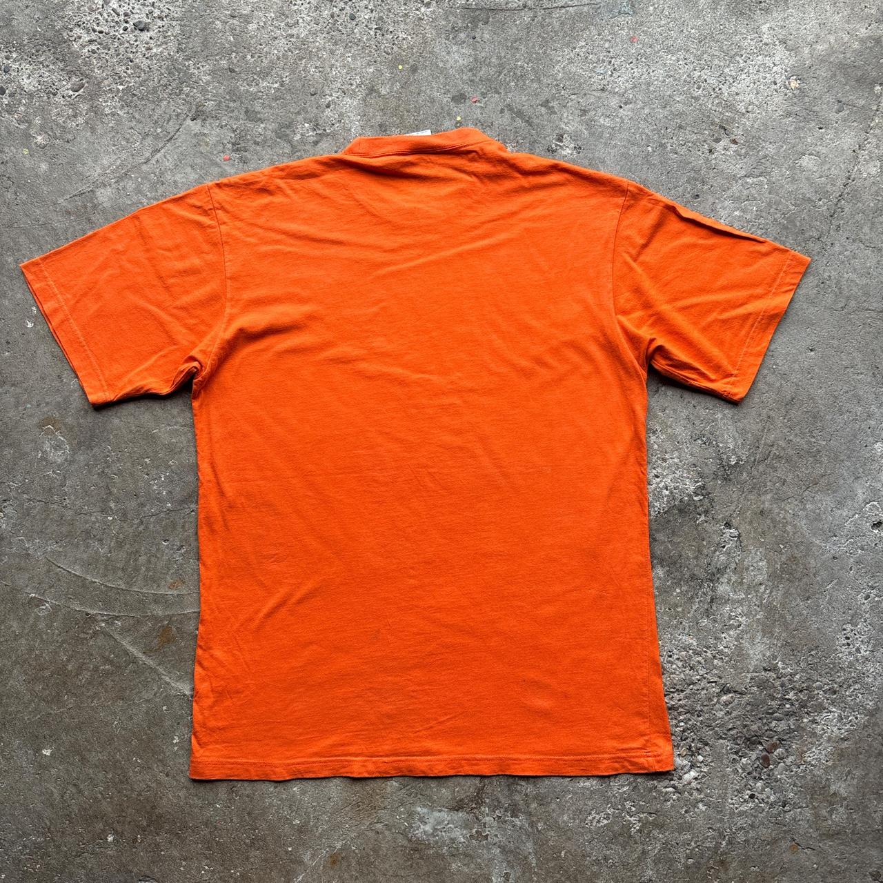 Orange Nike graphic tee