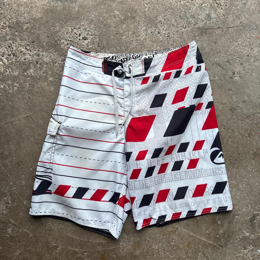 White, red and black 00s Quicksilver Dane Reynolds Board Shorts