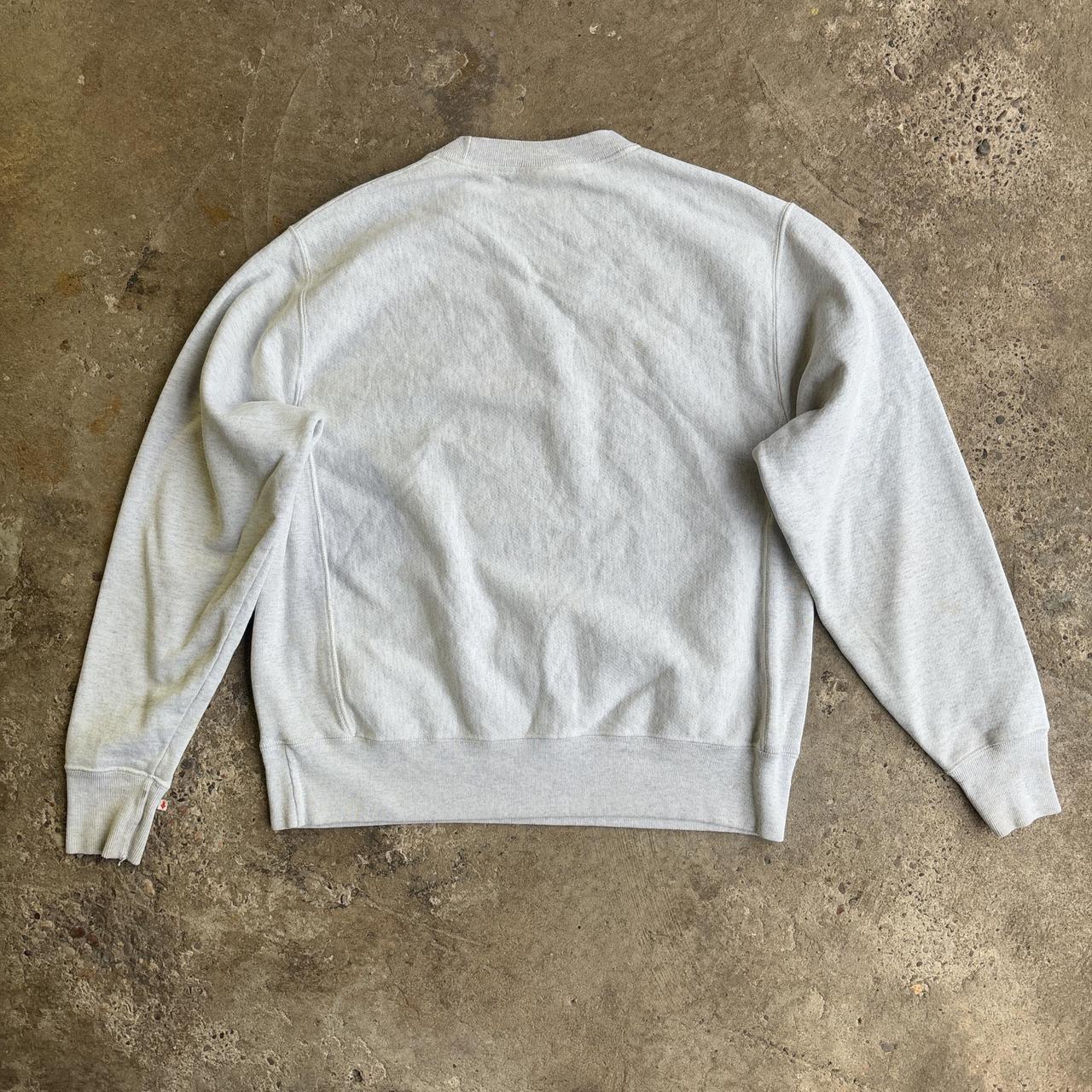 Champion grey crewneck sweatshirt with purple Northern Iowa University logo