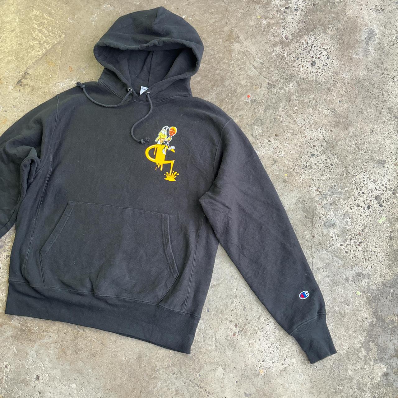 Black Champion hoodie with yellow Honey Nut design
