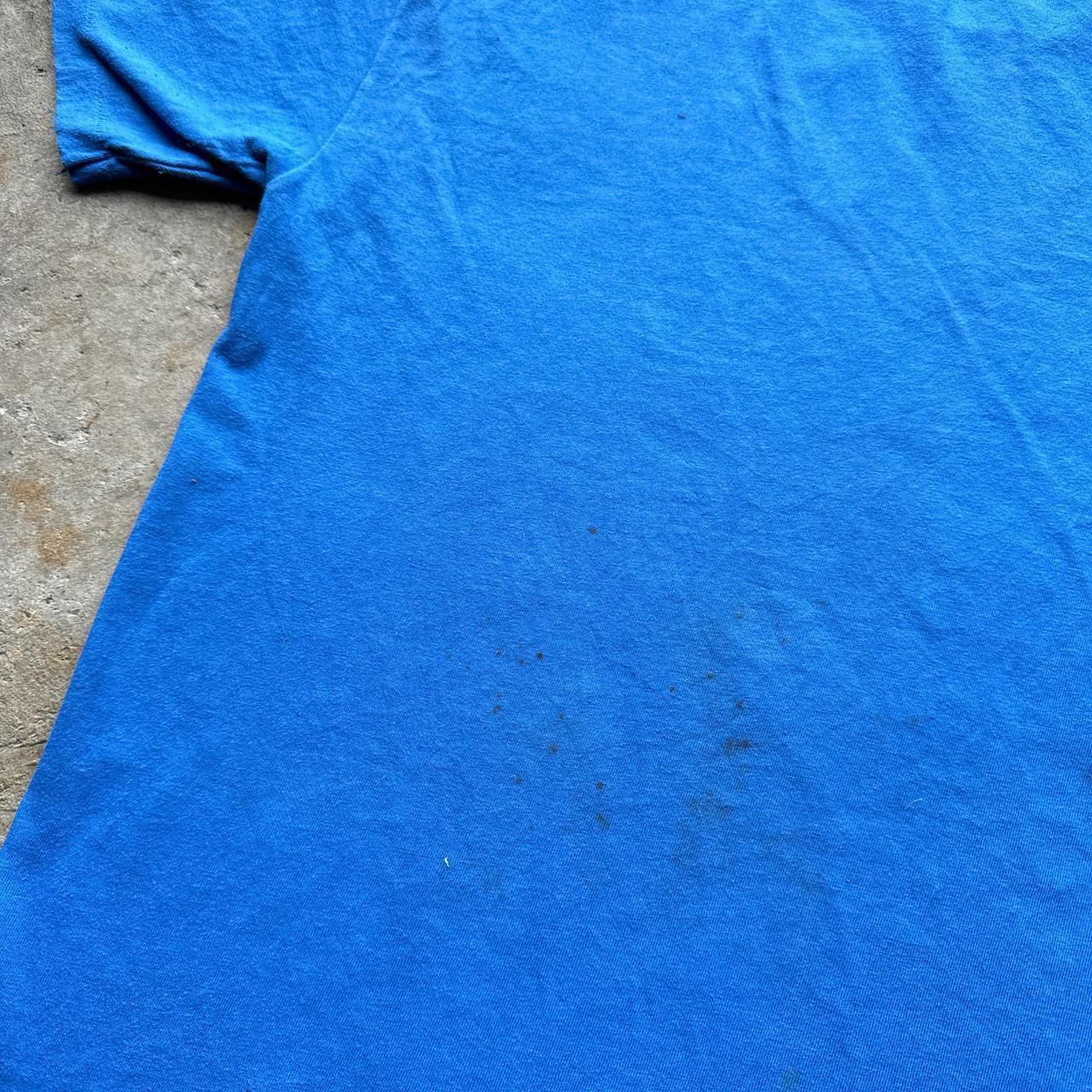 Blue graphic tee with Celtic print