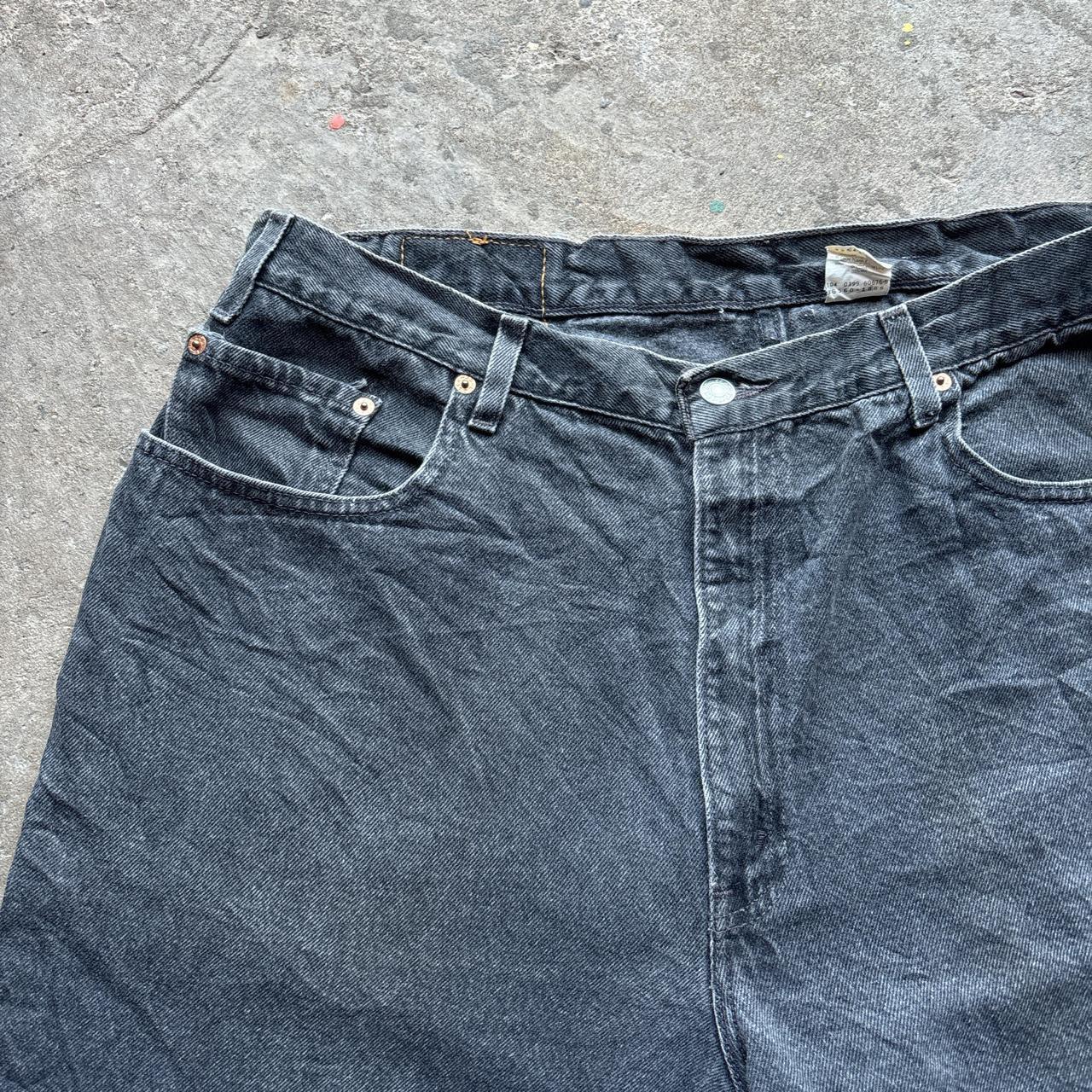 Washed black Levi’s 560 shorts