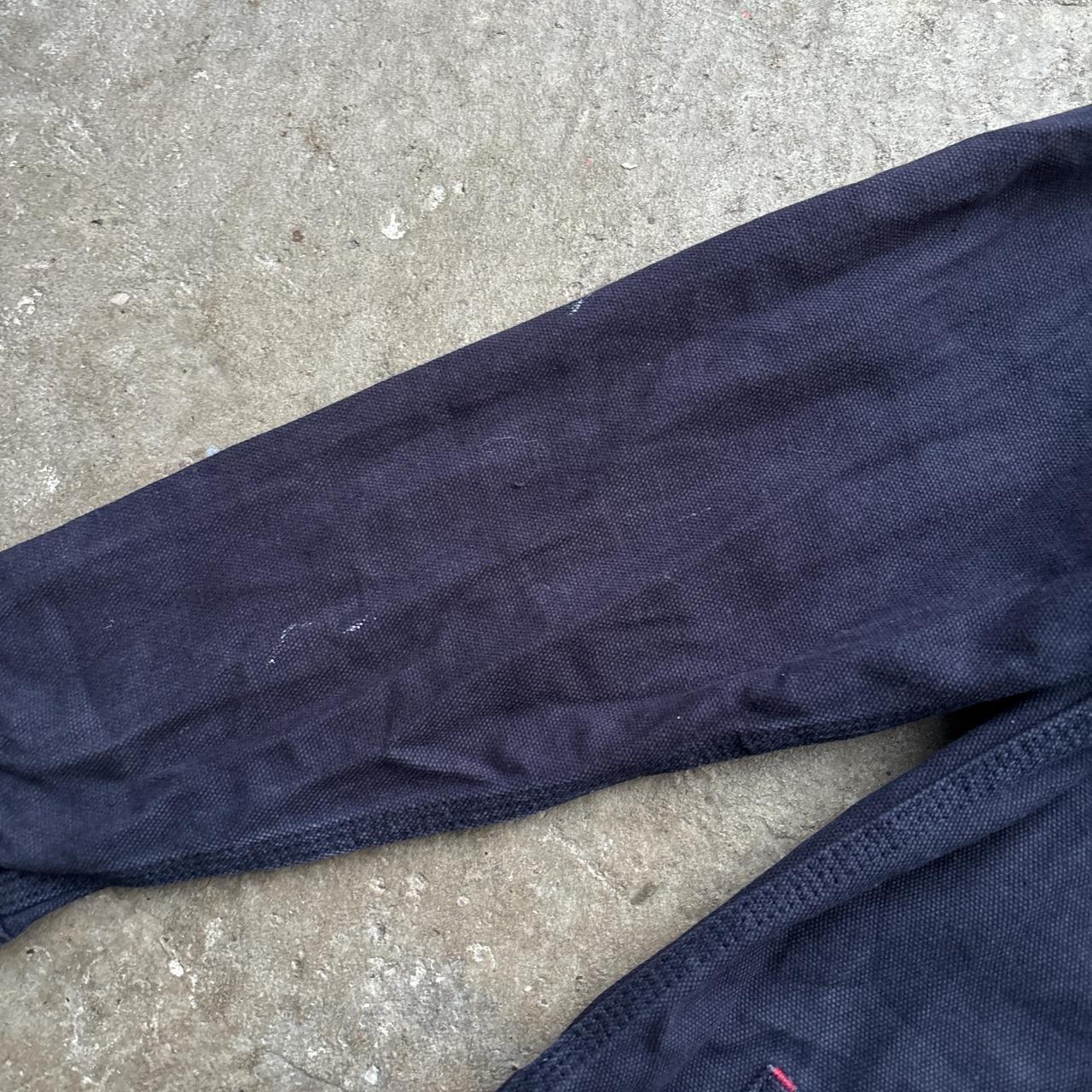 Navy workwear jacket with burgundy collar