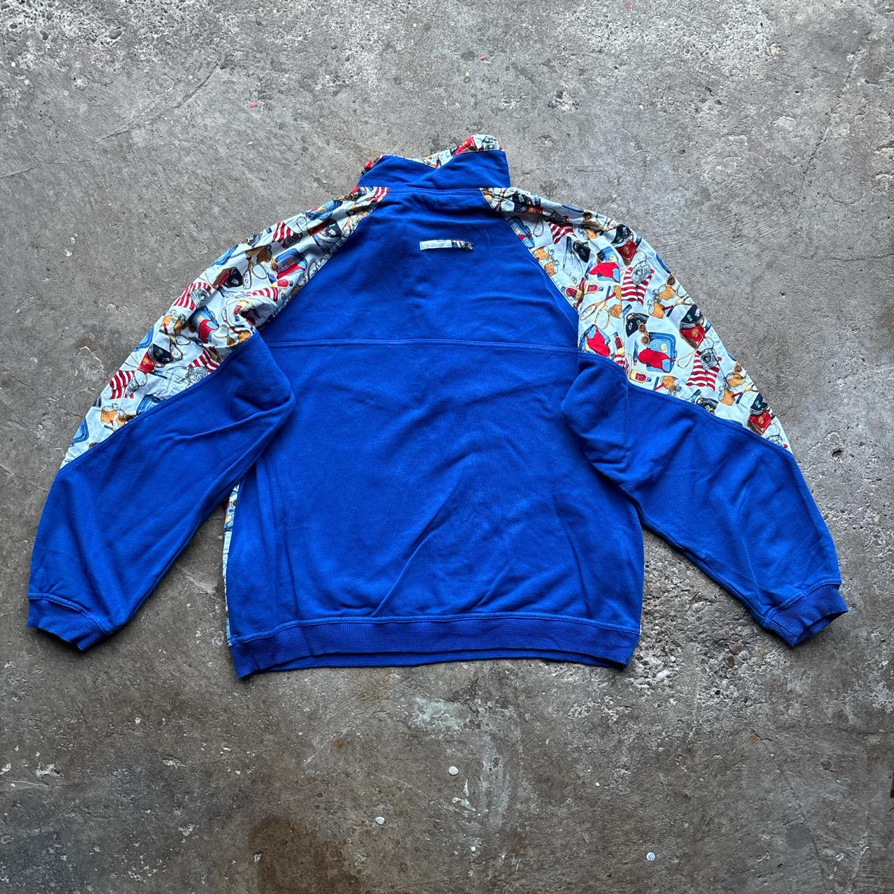 Blue and patterned half-zip sweatshirt
