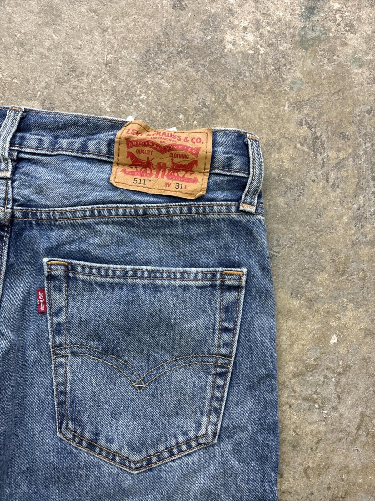 Distressed Blue Denim Levi’s 511 Men’s Cut Off Shorts - W31