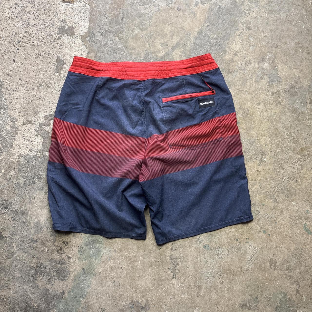 Red and navy Quiksilver board shorts - W32