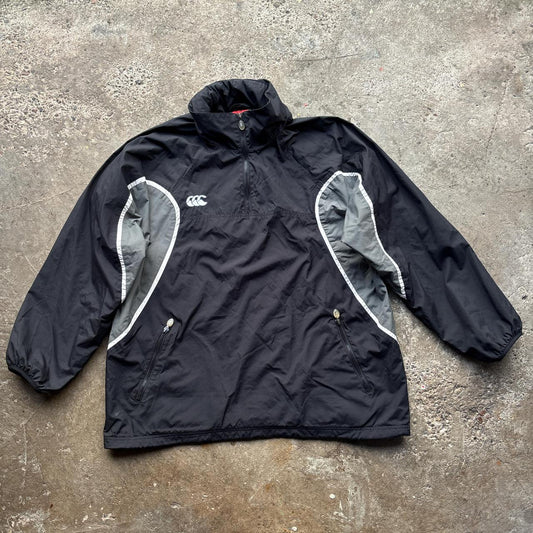 Black and grey Canterbury quarter zip windbreaker