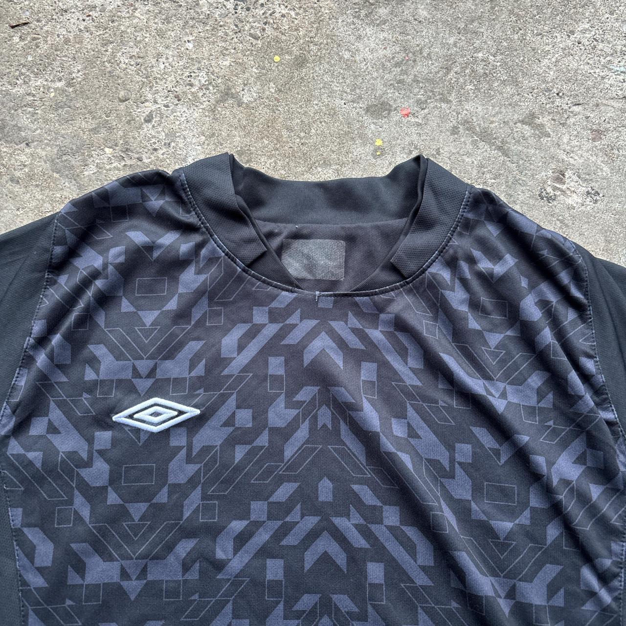 Black Umbro activewear top with embroidered logo