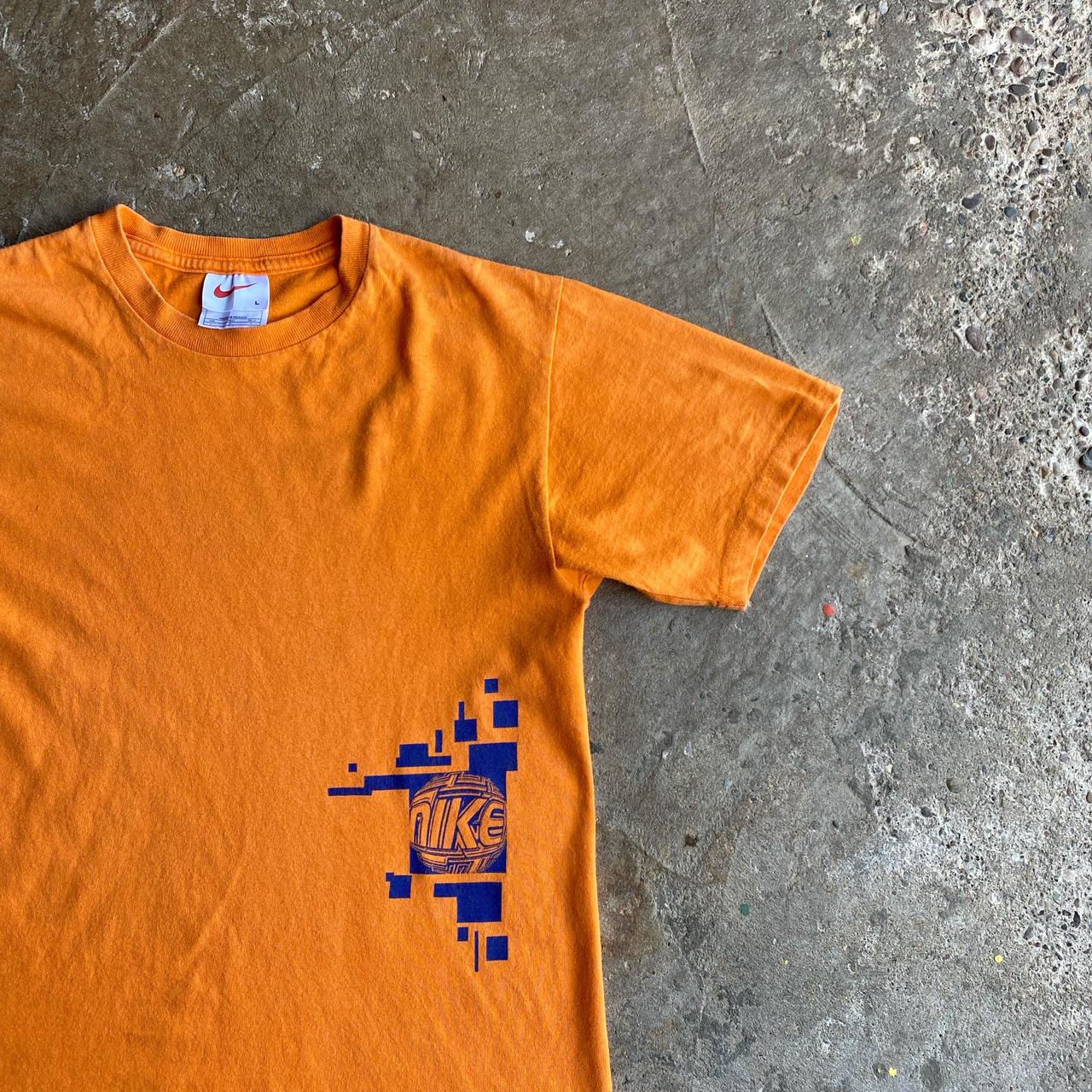Orange Nike Graphic T-Shirt - L (women’s)