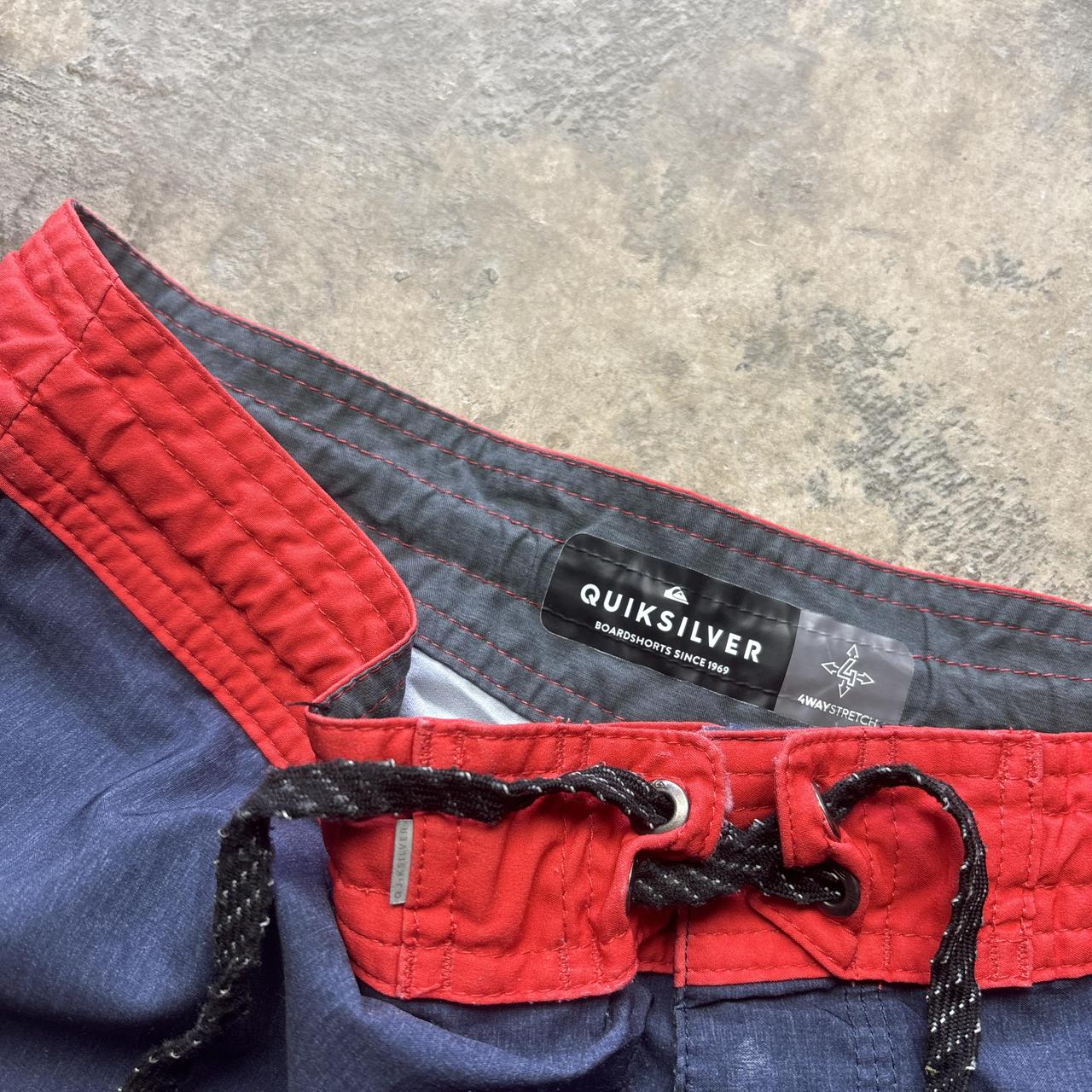 Red and navy Quiksilver board shorts - W32