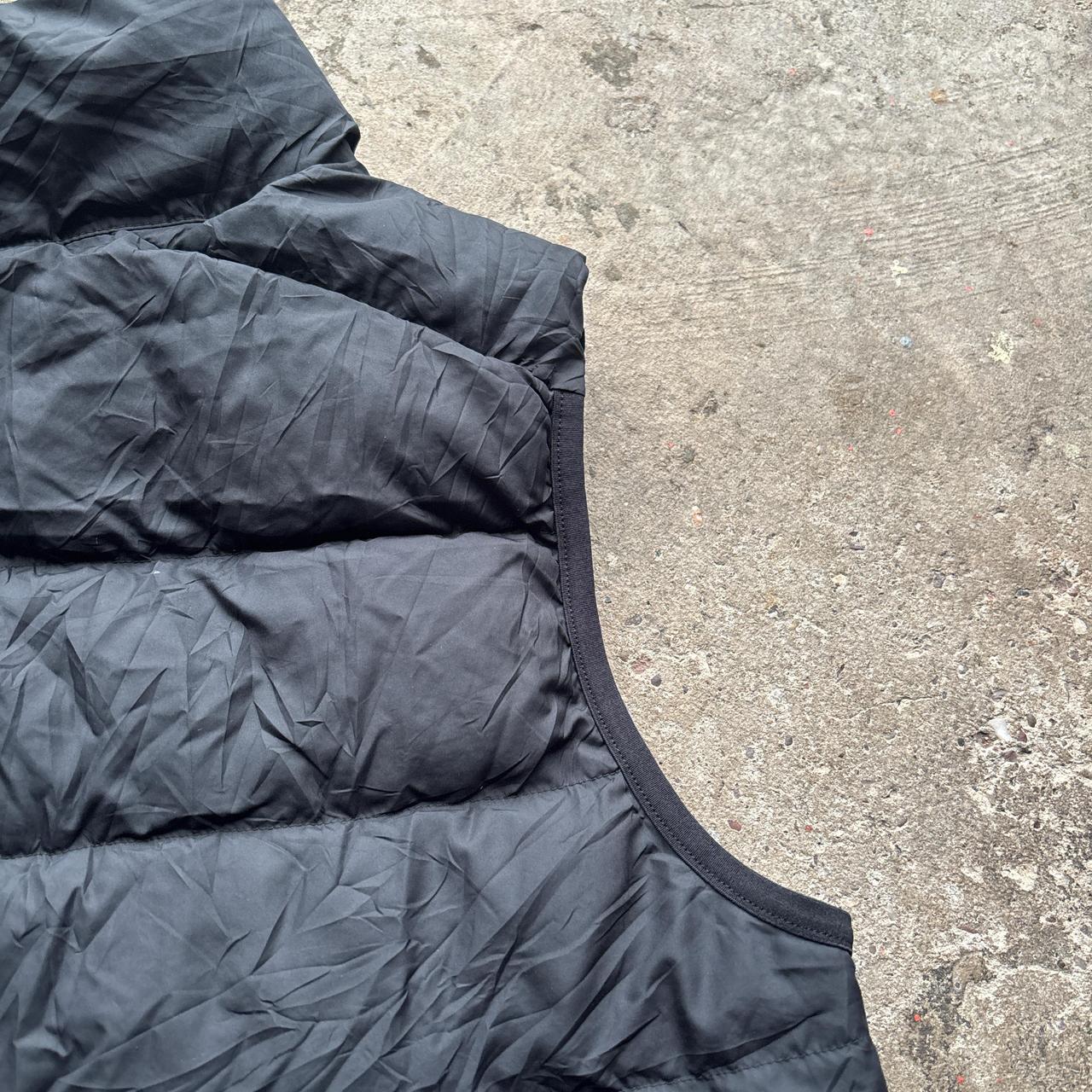 Black Nike puffer gilet with Melbourne Stars logo