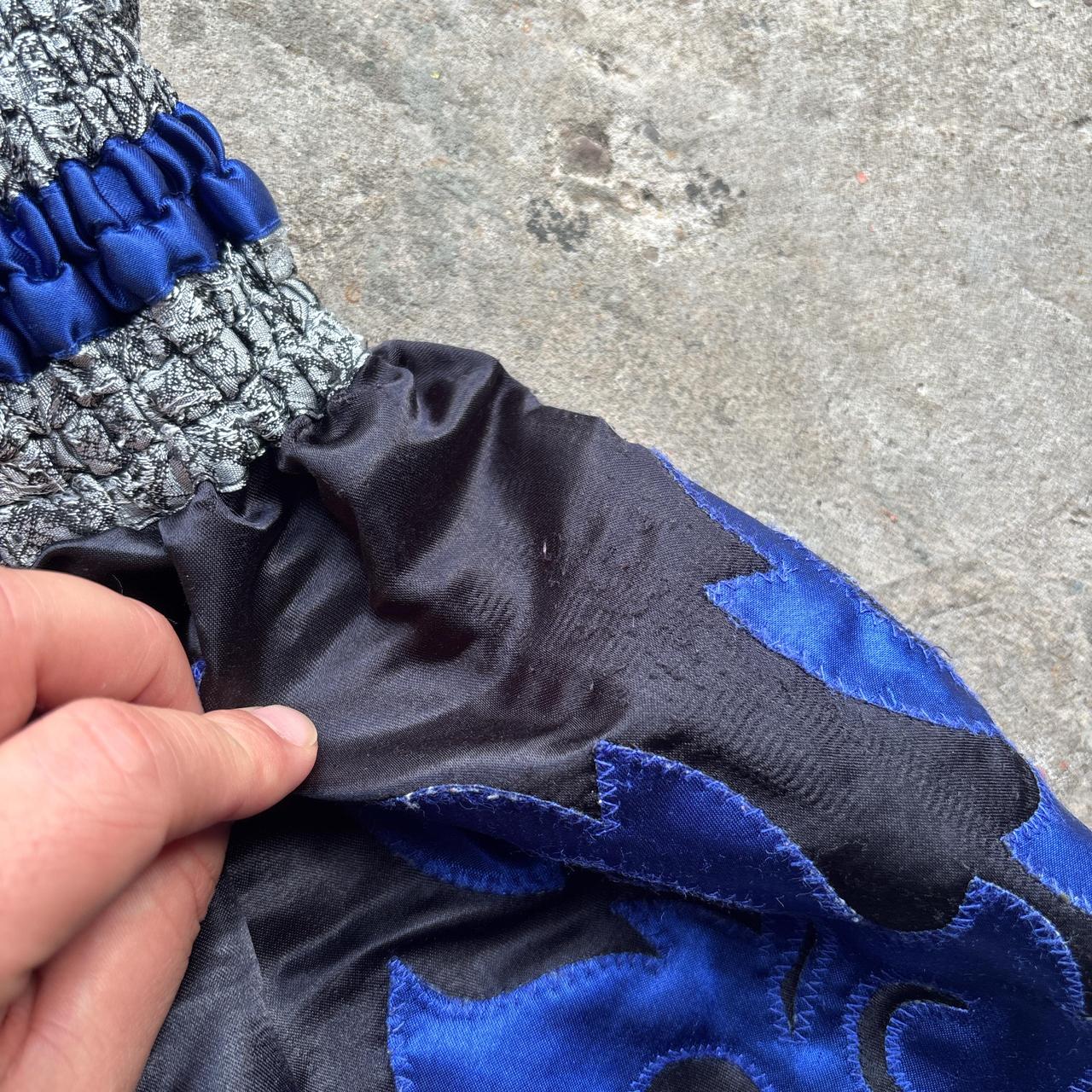 Black and blue Muay Thai shorts