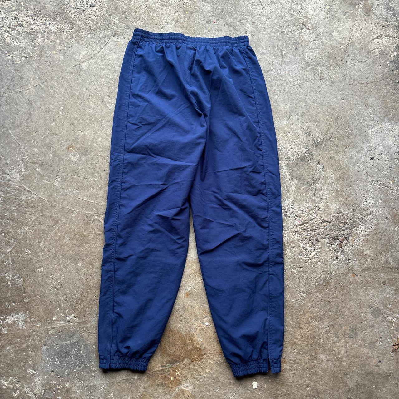 Navy Adidas track pants either blue detailing