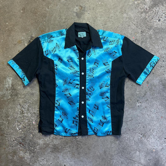 Blue and black musical notes bowling shirt